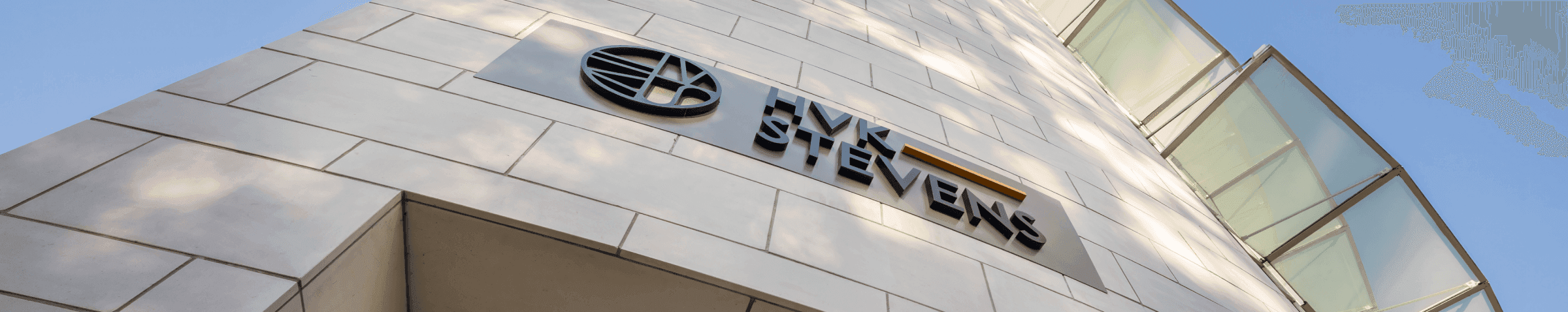 Hvk stevens logo on building facade