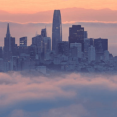 San francisco skyline with bay bridge and fog